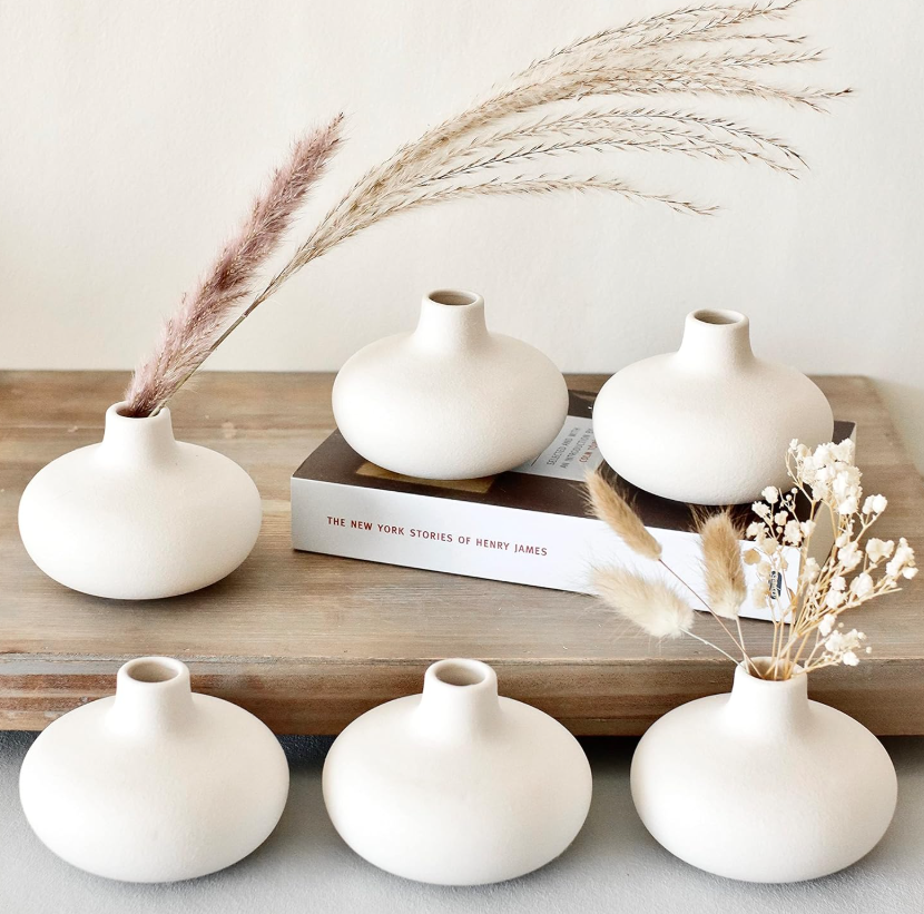Six-piece circular hollow mini ceramic bloom jars, clean northern minimalist design, casual style holders for dried foliage and greenery, great for events, shelf and coffee table styling