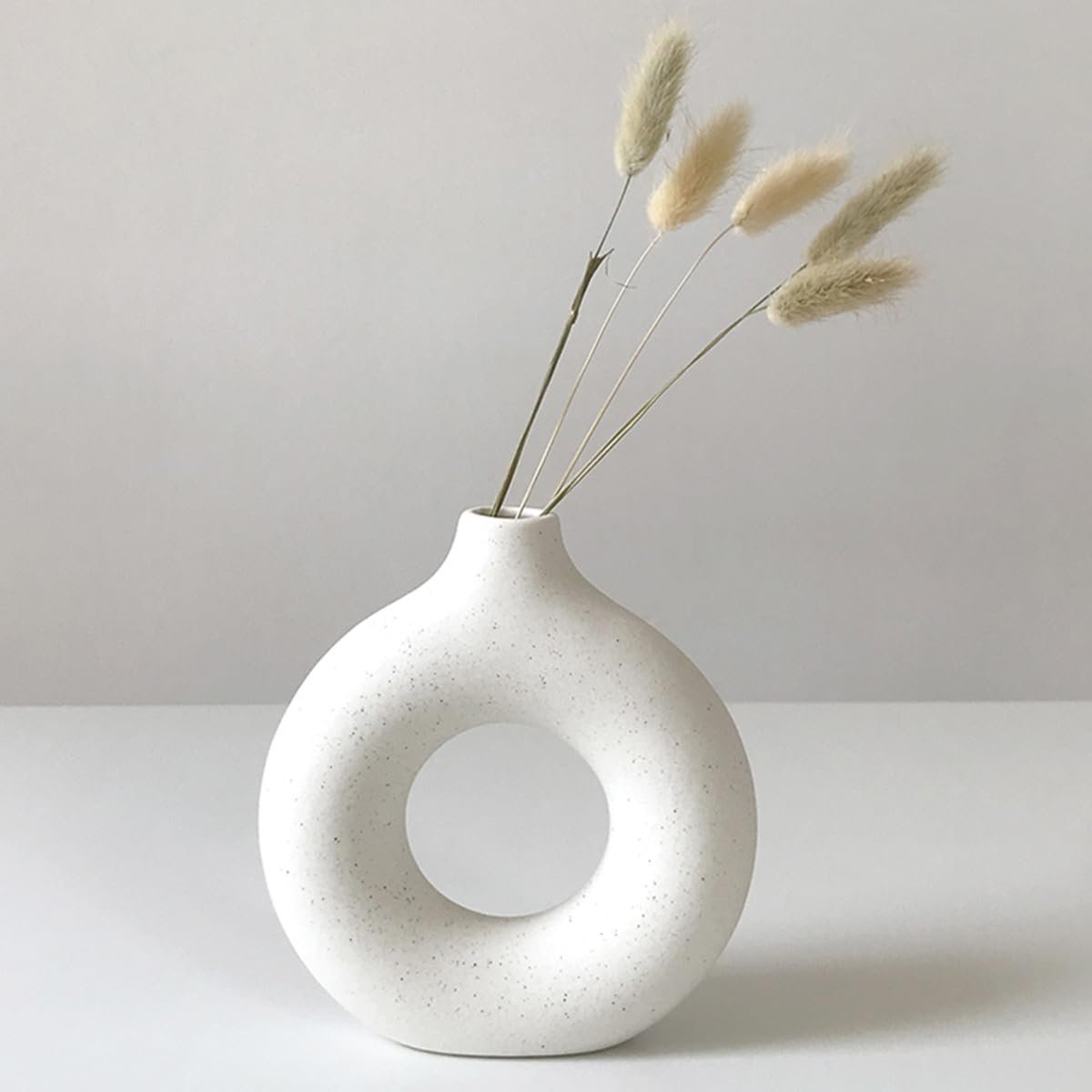 Tiny water-drop hollow ceramic bloom holder, streamlined northern casual interior ornament made for reed grass arrangements