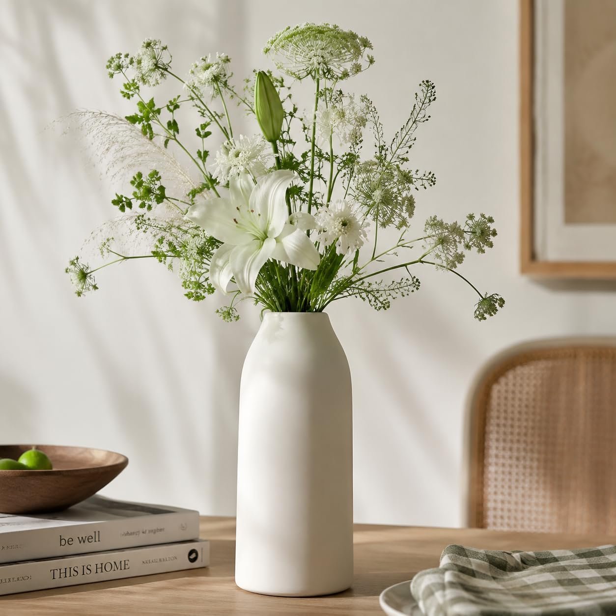 Tall matte solid white ceramic flower vessel, streamlined contemporary design, decorative focal piece for living room tabletops